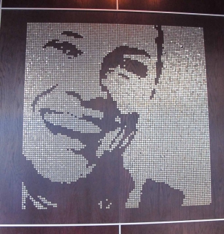 TAMARA – 2010 – MGFD CAYMAN TAMARA – 2010 – MGFD CAYMAN - Guatemalan coins and stainless steel nails on single stained veneer panel - 67” x 67”