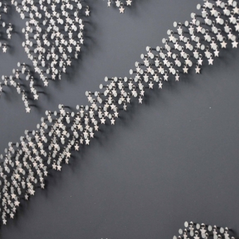 DEFENDER DETAIL - 2013 DEFENDER DETAIL - 2013 - Metal star charms on stainless steel nails on black wood panel- 48”X48” - US$7900